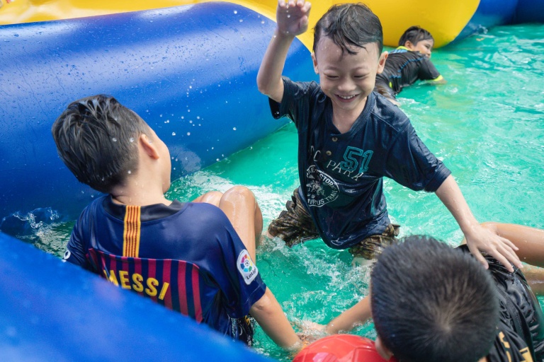 Children cooling themselves down at SPLASH-N-DASH