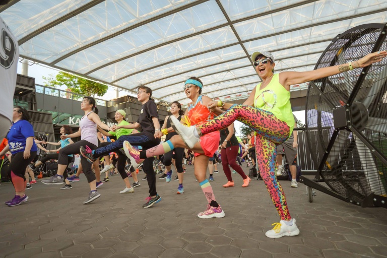 Group of friends having fun at the Summer Spin Jam